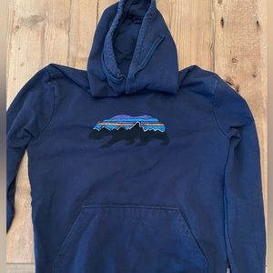 Navy hooded Patagonia sweatshirt size MED